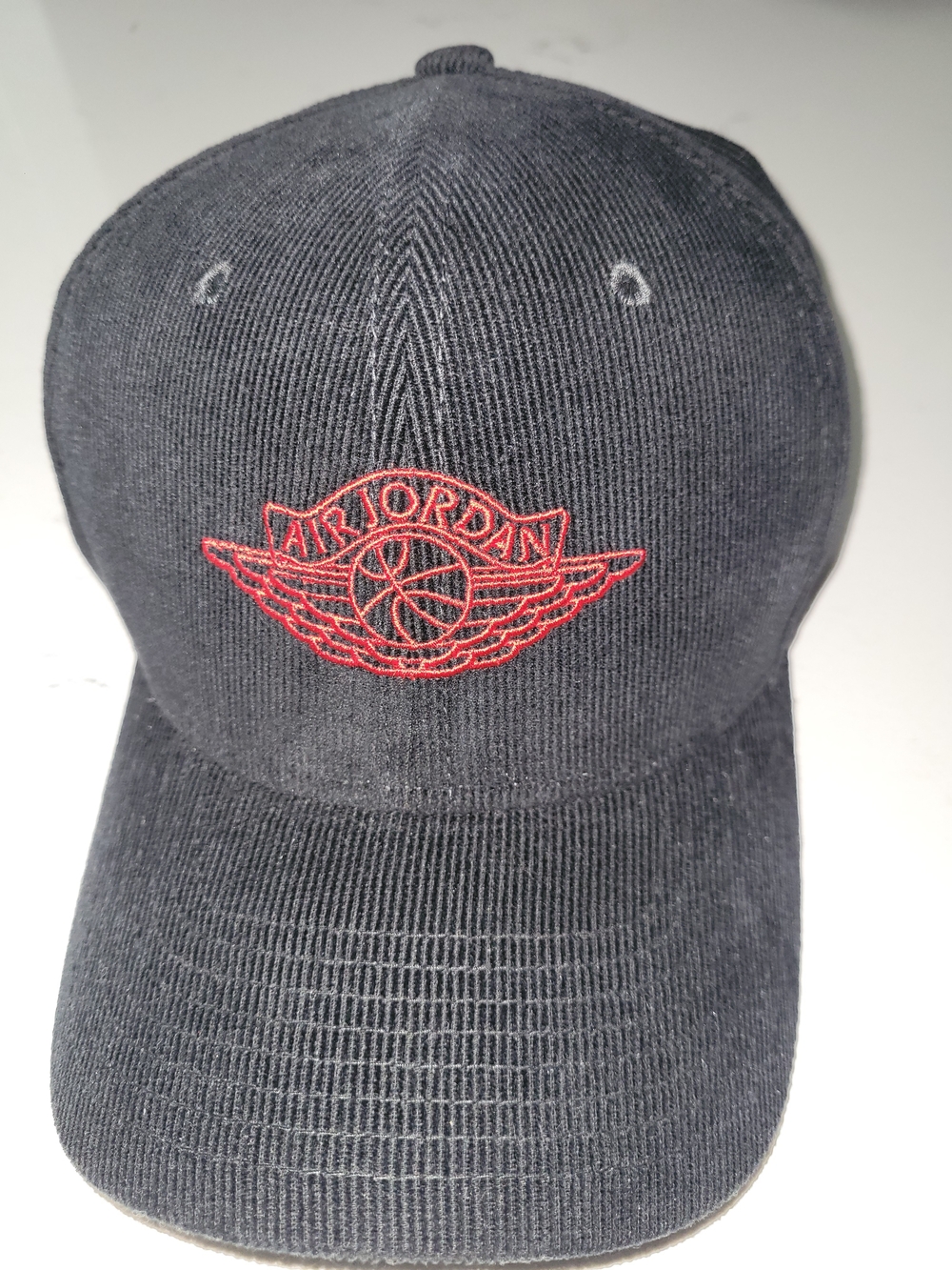Nike Black Cap with Red Embroidered Winged Logo